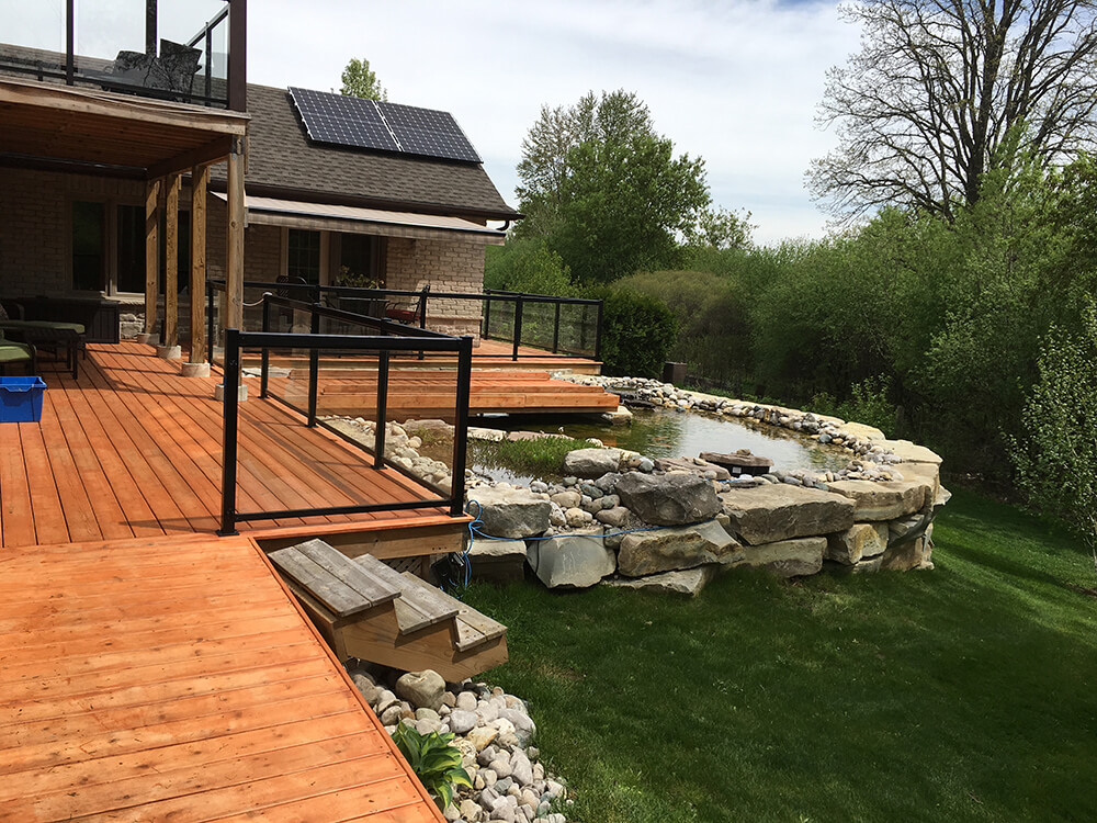 Large Above Ground Koi Pond With Waterfall A Touch Of Dutch Landscaping Garden Services Ltd