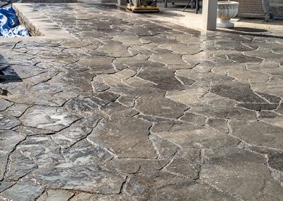 Raised stone patio - part of private backyard oasis