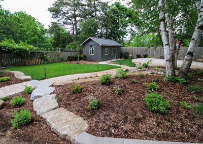 Stone labyrinth, patio, and walkway by A Touch of Dutch Stratford
