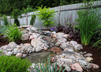 Pondless waterfall and garden Installation