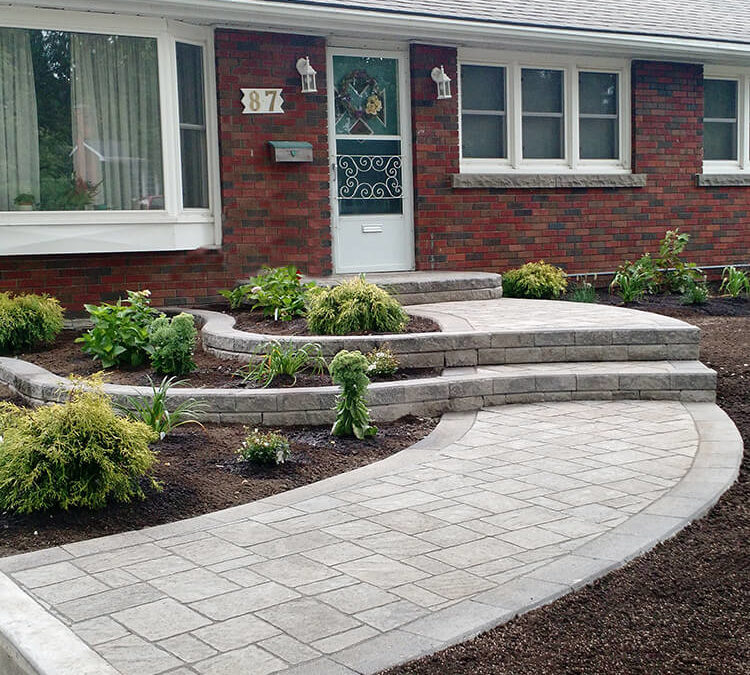 Stone Walkway & Raised Flowerbeds Increase Curb Appeal