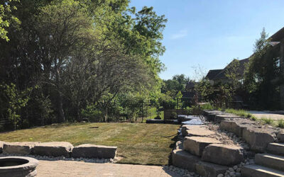 Level Outdoor Living with Retaining Walls and Firepit