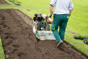 Improving drainage in garden flowerbed rototiller sandy soil