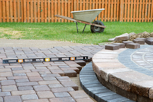 Planning a round stone patio in backyard landscaping budget