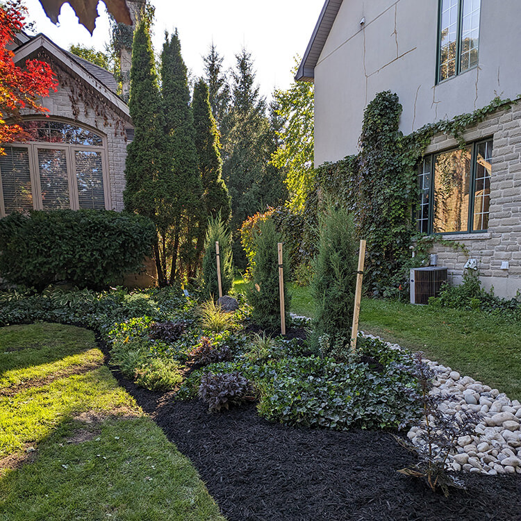 Flowerbed Redesign provides unexpected landscaping element that increases curb appeal